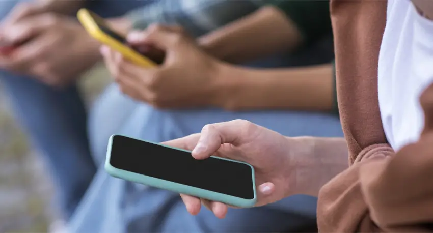 Group of people using mobile cell phones