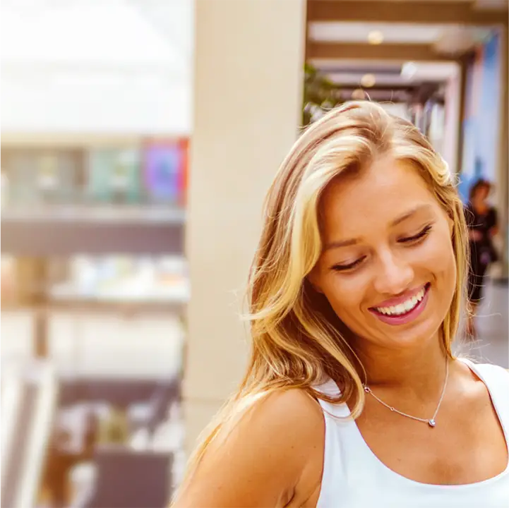 Woman shopping at mall tile 1